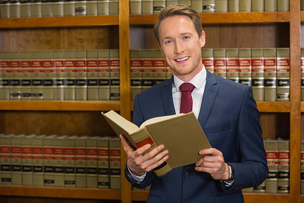istock Handsome lawyer in the law library 538235845
