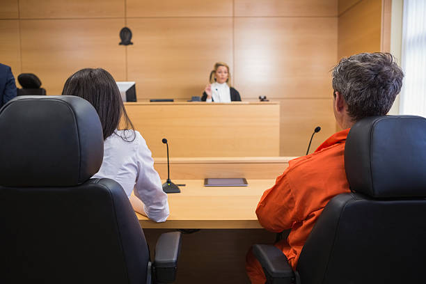 istock Lawyer and client listening to judge 538236355
