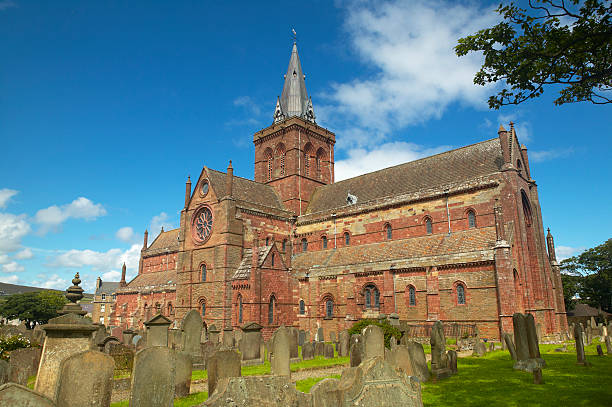 Scottish church and cemetery in Orkney. St Magnus. Scotland. UK Scottish church and cemetery in Orkney. St Magnus. Scotland. UK. Horizontal orkney islands stock pictures, royalty-free photos & images