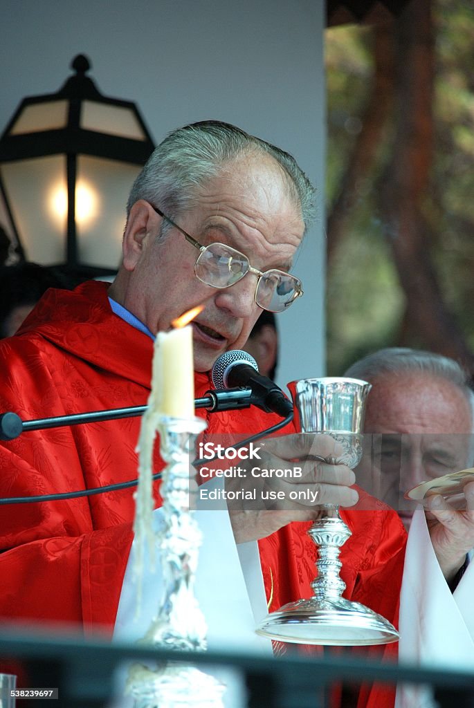 Spanish priest, Marbella. Marbella, Spain - June 8, 2008: Priest giving blessing in the Ermita de San Bernabe during the Romeria San Bernabe procession, Marbella, Costa del Sol, Malaga Province, Andalusia, Spain, Western Europe. 2015 Stock Photo