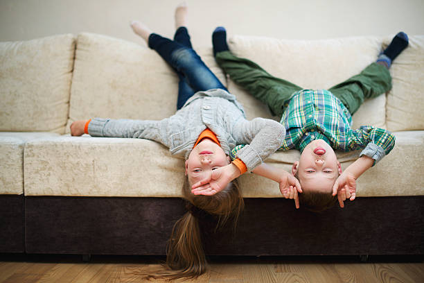 istock boy and girl fool upside down 538240245