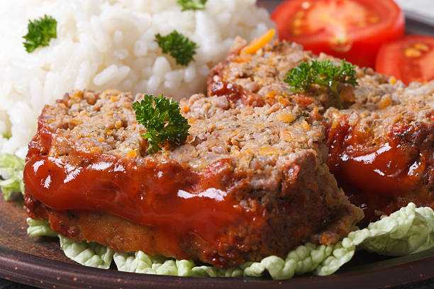 istock meatloaf with rice and vegetables on a plate macro 538241781