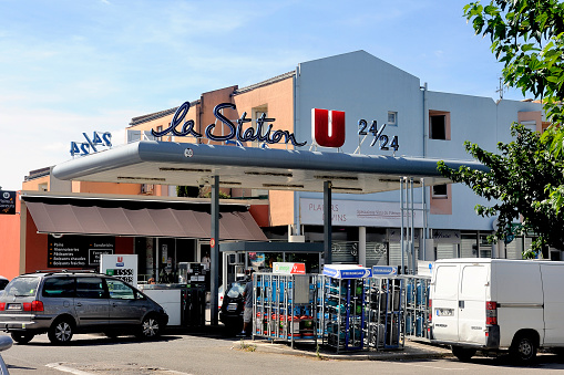 Anduze, France – August 24, 2014: Service station on a French supermarket car park where the prices are generally lower than in a normal station.