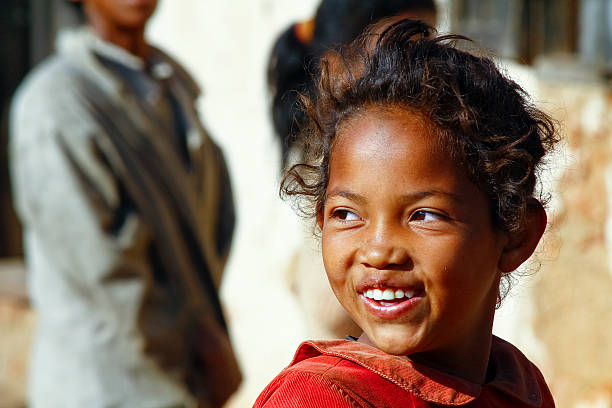 Smiling poor african girl, Madagascar