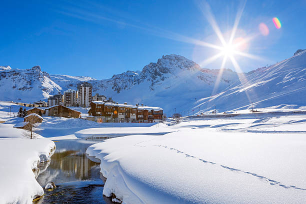 Tignes village with sun View of Tignes village with sun, France. savoie photos stock pictures, royalty-free photos & images