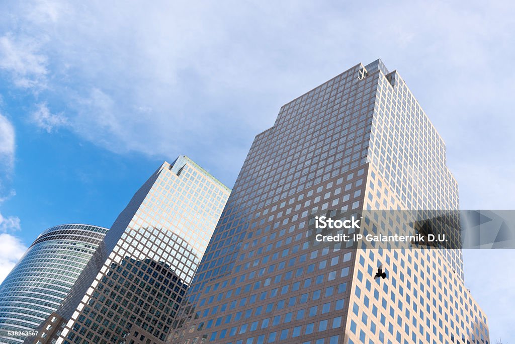 Skyscrapers from ground view with blue sky visible Corporate skyscrapers. Office buildings. Business district. Financial center. Architecture 2015 Stock Photo