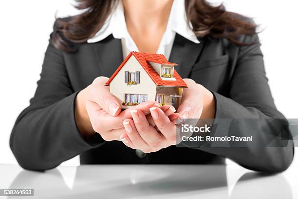 Real Estate Agent Gives Home Stock Photo - Download Image Now - 2015, Adult, Apartment
