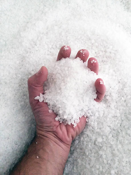 istock Hand in sea salt - Cave salt 538277409
