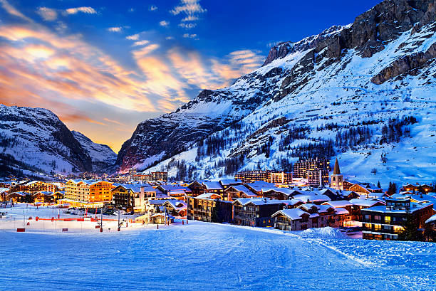 Val d'Isère city Famous and luxury place of Val d'Isere at sunset, Tarentaise, Alps, France savoie photos stock pictures, royalty-free photos & images