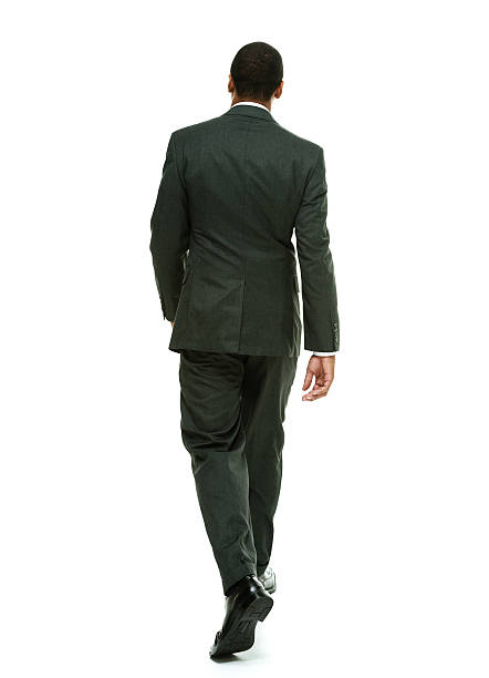 istock Rear view of businessman walking 538278661