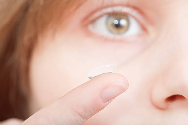 istock finger with corrective lens in front of face 538279835