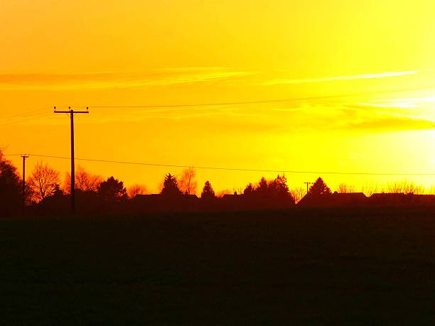 poste de telégrafo de pôr do sol - winter farm vibrant color shadow imagens e fotografias de stock