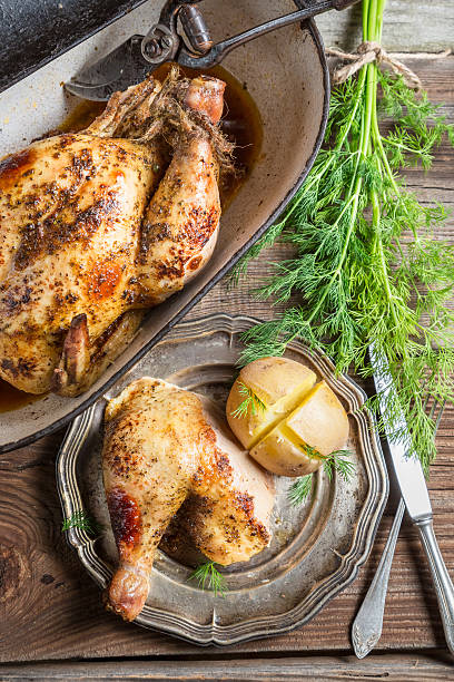 istock Roasted chicken and jacket potato with dill 538306017