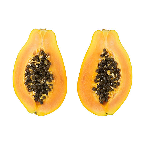 istock Two papaya halves on a white background. 538321055