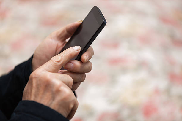 istock Asian old man use smart phone indoors 538322328
