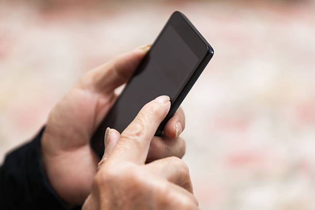 istock Asian old man use smart phone indoors 538322376