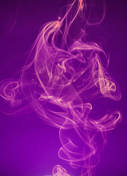 Blue smoke against a black background.