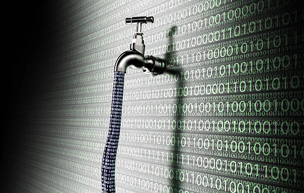concept of leaky software, data with a tap sticking out stock photo