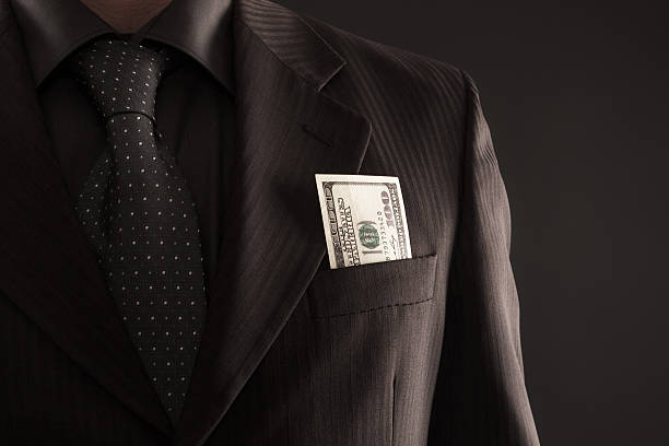 istock Businessman with one hundred dollars 538325519