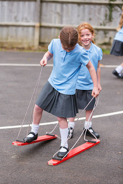 istock Girls Playing A Balance Game in the School Yard 538326085