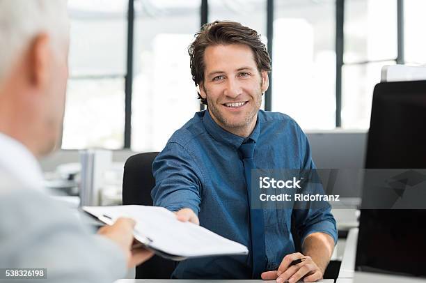 Business People Work Together Stock Photo - Download Image Now - CFO, Passing - Giving, Giving