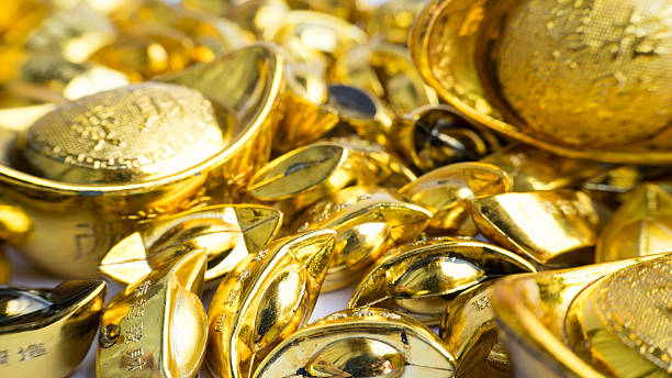 istock Shoe-shaped metal gold ingot (Yuan Bao), China 20th currency 538326245