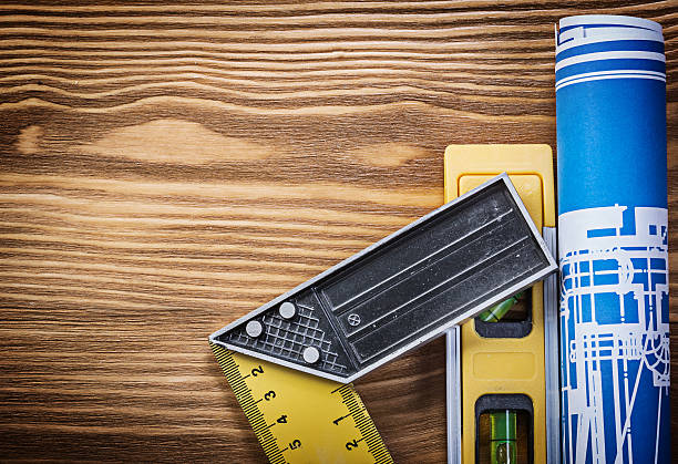 istock Blue construction drawing level try square on wooden board 538326670