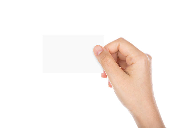 istock Women hand holding credit card isolated on white background 538326791