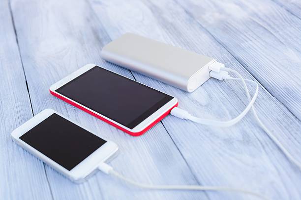 istock Powerbank charging two smartphones 538329834