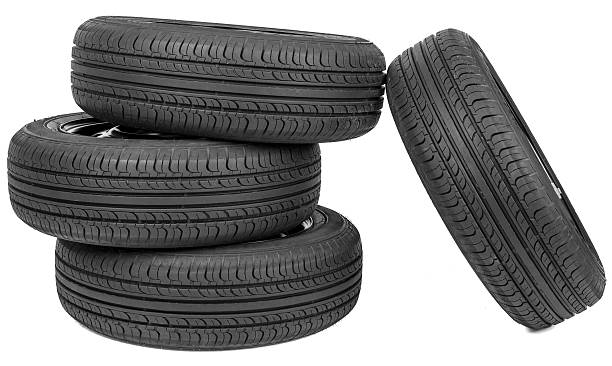 istock Stack of four wheel new black tyres 538330374