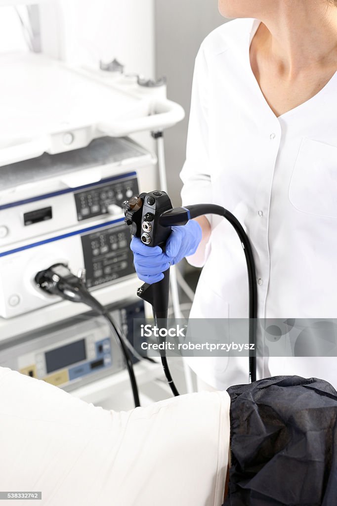 endoscope apparatus for testing gastrointestinal Doctor gastroenterologist with probe to perform gastroscopy and colonoscopy Colonoscopy Stock Photo