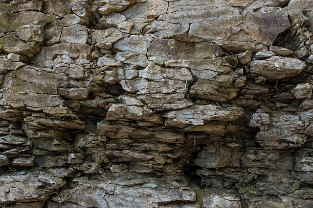 istock Stone wall of rock with cracks 538333256