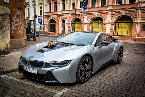 Vilnius, Lithuania - August 13, 2015: The BMW i8 plug-in hybrid sports car parked on a street in the Old Town in Vilnius, Lithuania. The BMW i8 produced by the German brand BMW since April 2014