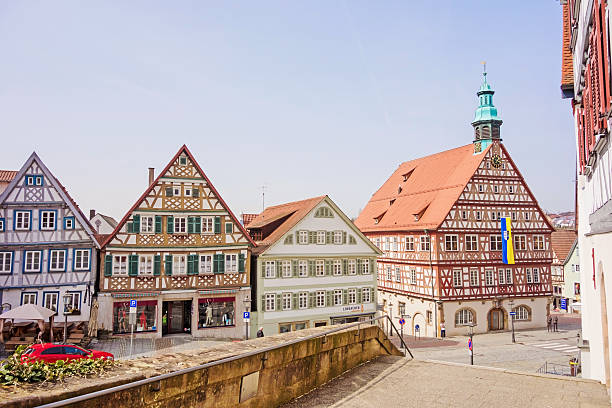 Backnang, Germany - April 03, 2016: In the city center of Backnang at marketplace, town hall  on the right, half-timbered buildings.