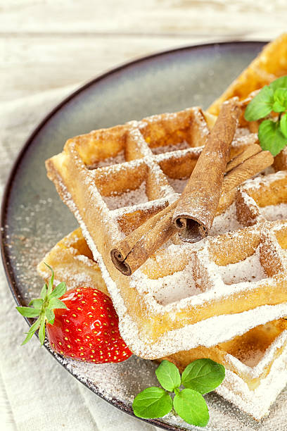 istock Waffles with Fresh Strawberries and cinnamon sticks 538335426