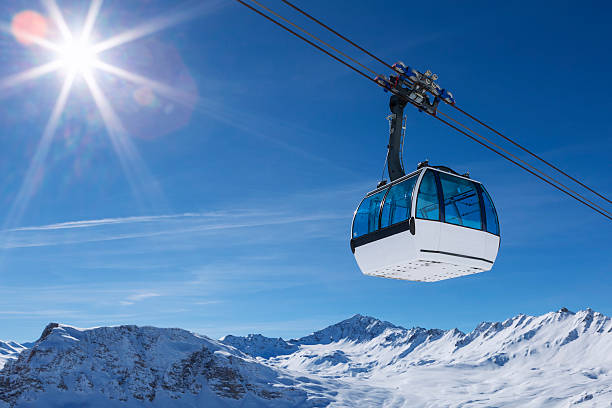cable car in a mountain area cable car in a mountain area, France. overhead cable car photos stock pictures, royalty-free photos & images