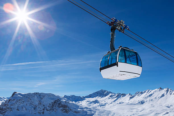 cable car in a mountain area cable car in a mountain area, France. gondola stock pictures, royalty-free photos & images