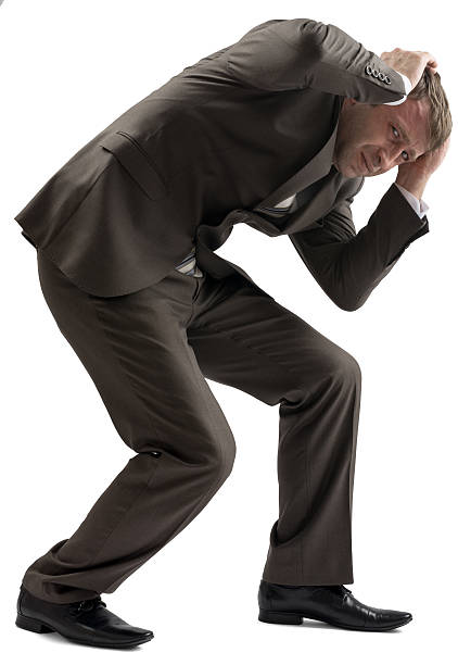 istock Frustrated businessman holding his head 538338436