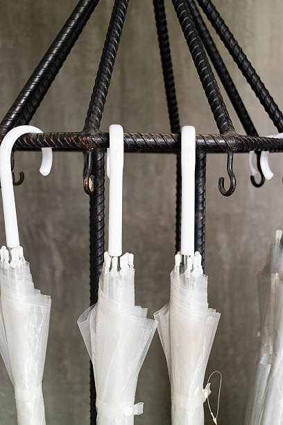 istock transparent umbrella on black metal stand 538338778