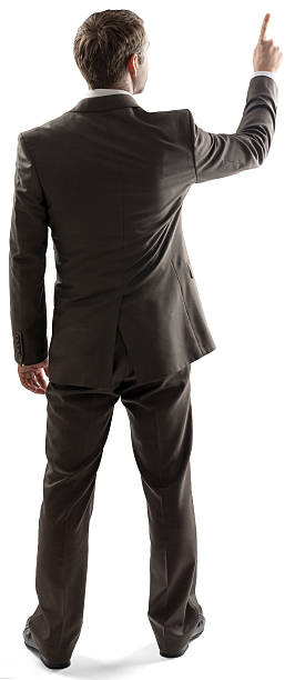 istock Rear view of businessman pointing at copy space 538338832