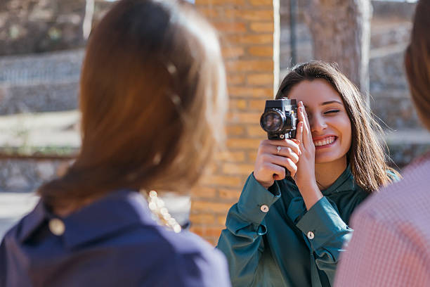 istock Smiling photographer taking shot 538338966