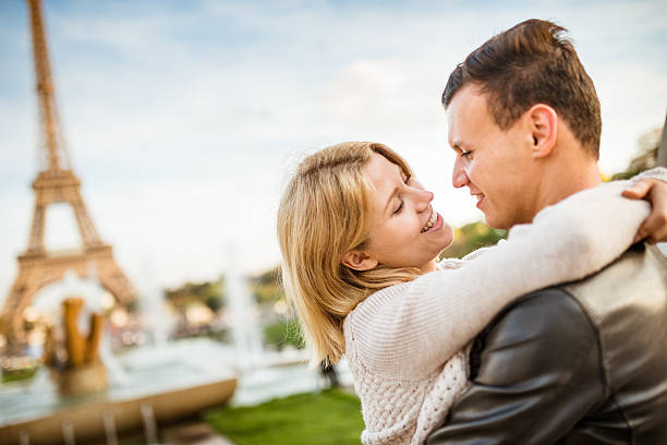 istock romantic couple kissing at sunlight on Paris 538338997