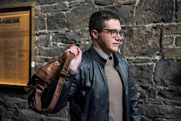 istock handsome man strolling in the city 538339635
