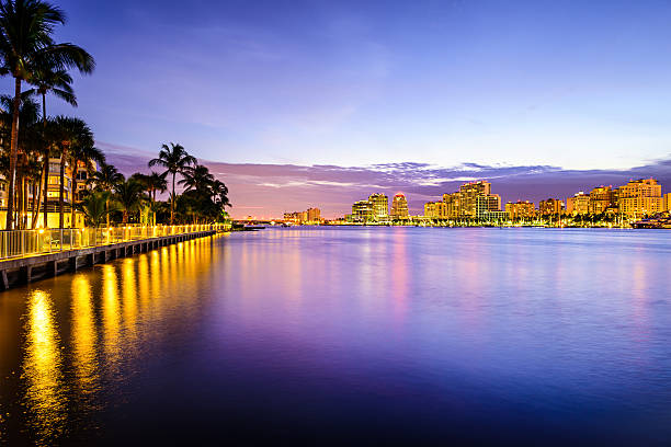 West Palm Beach Florida West Palm Beach, Florida, USA on the Intracoastal Waterway at twilight. west palm beach stock pictures, royalty-free photos & images