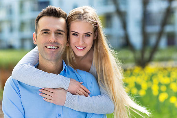 istock Young couple embracing outdoors 538341648