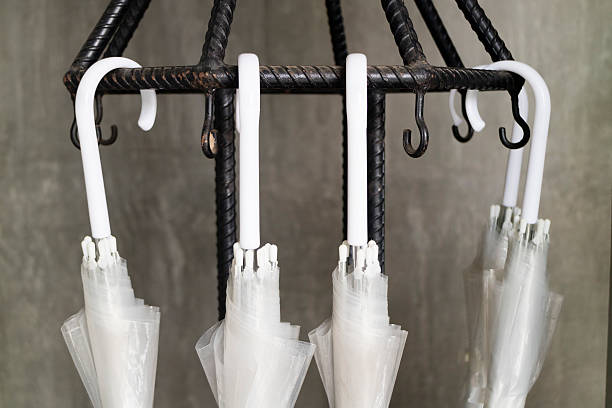 istock transparent umbrella on black metal stand 538342692