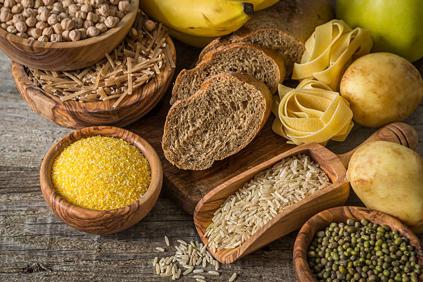 istock Selection of comptex carbohydrates sources on wood background 538343182