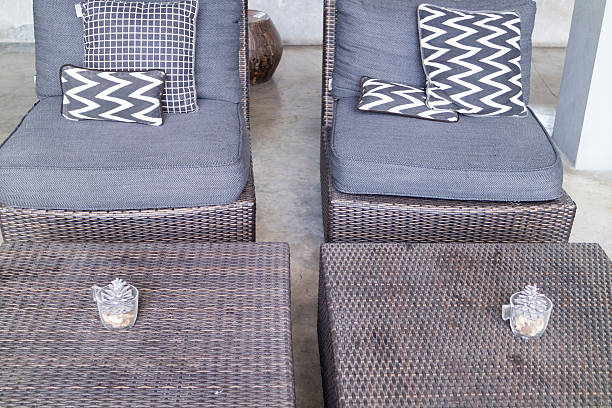 istock black, white cushion and pillow on wicker chair 538344188
