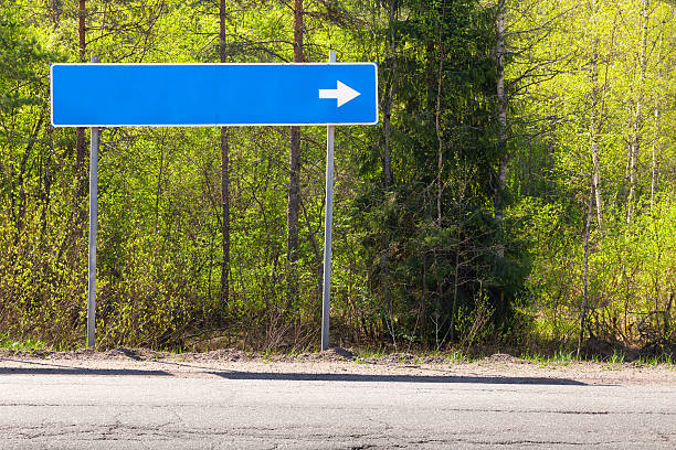 istock Blue road sign near highway with blank place 538344844