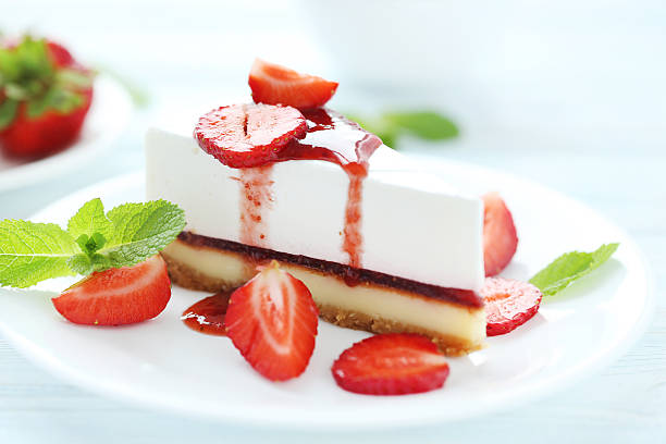 istock Strawberry cheesecake on plate on blue wooden table 538346518